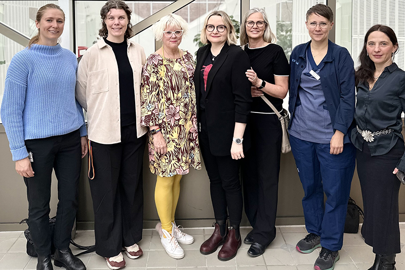 Gruppbild på sju personer